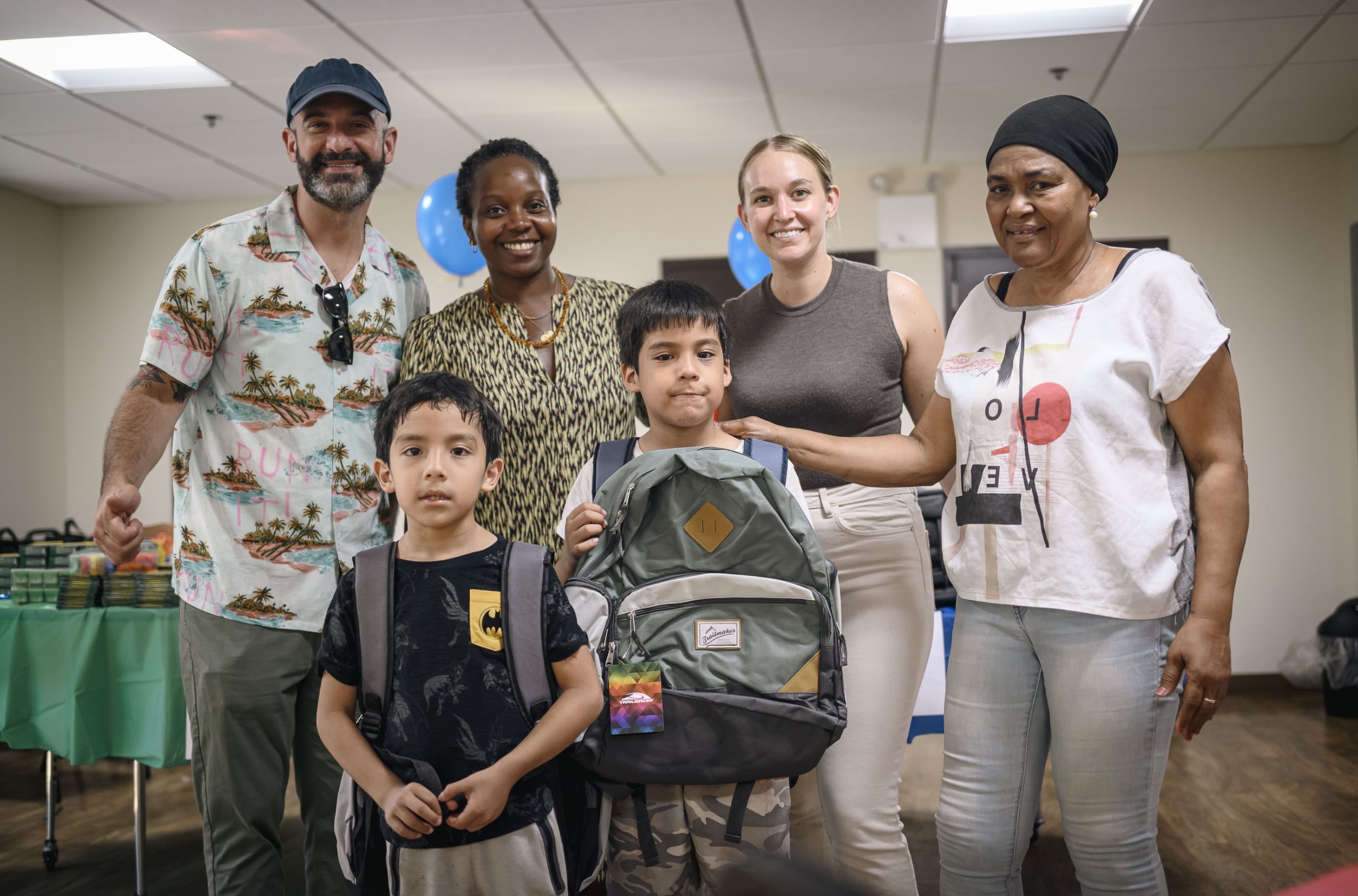 Belveron Donates and Distributes Backpacks and School Supplies in Harlem